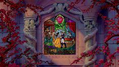 the stained glass window in the castle is decorated with pink flowers and vines, as well as an image of beauty and the beast