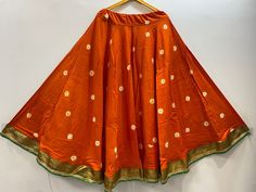 Dance Lehanga skirts for Garba/ dandiya Navratri season. fits regular size upto size 38/40. Colors available: orange and maroon. Orange Bollywood Choli With Bandhani Print, Festive Orange Choli With Bandhani Print, Traditional Orange Bandhani Print Choli, Fitted Orange Bandhani Traditional Wear, Orange Bandhani Print Sharara For Festivals, Traditional Orange Sharara With Bandhani Print, Traditional Orange Bandhani Print Sharara, Orange Bandhani Print Sharara For Festive Occasions, Orange Bandhani Print Sharara For Festive Season