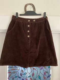 Adorable 90s brown corduroy skirt!! The corduroy is a nice thick material and it is a super flattering style. Perfect for winter with some tights and boots. I wish it fit me! Marked size: 8 Waist: 14" Length: 19" Corduroy Mini Skirt Pattern, Brown Corduroy Mini Skirt, Brown Corduroy Mini Skirt For Fall, Vintage Corduroy Skirt For Fall, Corduroy Skirt Outfit Fall, 80s Aesthetic Outfits, Cosy Clothes, 80's Clothes, Cosy Outfits