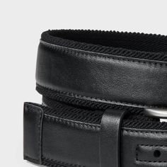 The Overlay Webbed Belt from Goodfellow & Co™ makes an effortlessly cool update to your collection of accessories. The black stretch overlay belt features a webbed design with stitch detailing on the side for a classic look, while a shiny metal buckle closure with multiple holes helps you to get a customized fit. Pair it with everything from a jeans-and-tee combo to formalwear for a perfectly sleek finishing touch. Goodfellow & Co™: Where style & fit are always in good company. Black Fitted Modern Belt, Modern Fitted Black Belt, Black Belt For Workwear, Black Adjustable Belts For Business, Fitted Black Belt For Workwear, Black Adjustable Casual Belt, Casual Black Adjustable Belt, Black Belt With Removable Buckle, Fitted Black Leather Belt