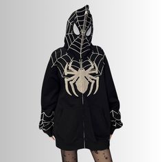 Transform your wardrobe with our Dark Spider-Man Embroidered Hoodie. This exclusive piece features intricate embroidery, elevating your style to the next level. Made from premium materials, its comfort and style are unmatched. Embrace the sophistication of our hoodie and make a statement wherever you go. Features: -100% Cotton -Fixed Hood -Full zip closure -Ribbed Cuffs And Hem -Super Soft Fabric -Spider Jacquard Design -Solid Color -High Street style Jacquard Design, Intricate Embroidery, Embroidered Hoodie, High Fashion Street Style, Black Hoodie, Next Level, Soft Fabric, Soft Fabrics, Spiderman