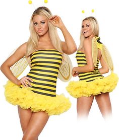 a woman in a bee costume posing for the camera