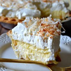 a piece of pie sitting on top of a white plate with a fork in it