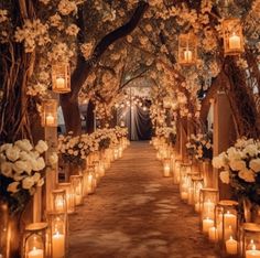 an outdoor ceremony with candles and flowers