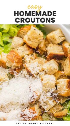 homemade croutons with parmesan cheese and lettuce in a white bowl