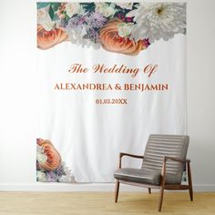 a chair sitting in front of a wedding banner