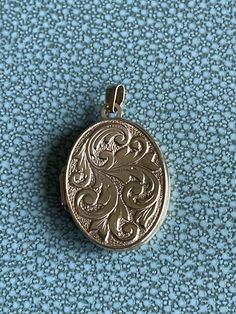 SOLID ( not filled nor plated) 9k Gold Embossed Filigree Mid Victorian  Locket approx. 1" with the ring N to S  The bale looks newer to me No hallmarks but tests 9k yellow gold No chain included  Victorian Aesthetic Movement 1860-1900 NOTE: back side gold is damaged/cracked but still totally usable - priced accordingly - see photos - front is perfect During the mid-19th century, the provocative and sensuous Aesthetic movement threatened to dismantle Britain's fussy, overbearing, and conservative Victorian Gold Filigree Locket Necklace, Ornate Antique Gold Locket Necklace Collectible, Victorian Gold Metal Locket Necklace, Ornate Brass Locket Jewelry, Antique Gold Locket, Antique Brass Filigree Locket Necklace, Pre Raphaelite Paintings, Aesthetic Era, Victorian Locket