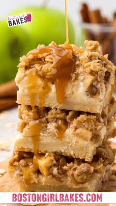 A stack of Delicious Caramel Apple Cheesecake Bars drizzled with caramel sauce tempts you during apple season. The buttery shortbread crust holds layers of oats and apple chunks. In the background, fresh green apples, cinnamon sticks, and a jar filled with more cinnamon sticks complete the scene. Apple Crumb Bars, Pear Dessert Recipes, Celebrating Sweets, Apple Cheesecake Bars, Caramel Apple Cheesecake Bars, Caramel Apple Bars, Pear Pie, Crumb Bars, Pear Dessert