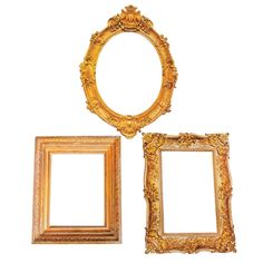 three gold frames are sitting next to each other