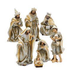 the figurines have been made to look like they are holding their baby jesus