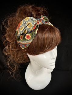 Fabric turban head band in a retro cotton print, on the 1940s land girl style and 1950s Rockabilly fashions. A real statement piece with a standard 1 inch width inner Alice band attached within the lining to provide an easy to wear design. Our range of turban bands are the perfect easy to wear accessory and are worn exactly as an Alice band finishing behind the ears. (These bands do not go all the way around the back of the head, so are perfect for all hair styles. This unique creation is a stun Festival Headwrap Headband, Bohemian Bandana Headband For Festival, Bohemian Bandana Styled As Headband For Festivals, Bohemian Bandana Print Headscarf For Summer, Bohemian Adjustable Headwrap With Matching Headband, Adjustable Bohemian Headwrap With Matching Headband, Bohemian Bandana Print Headwrap For Festivals, Hippie Style Headwrap One Size, Hippie Style Headwrap