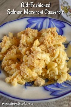 an old fashioned macaroni casserole is on a blue and white plate