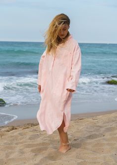 The Powder pink linen dress women is our favorite weekender. this Plus size maxi dress featuring an oversized relaxed fit with a front button closing. The womens long sleeve shirt dress is made from 100% linen, that is versatile for any occasion! This linen clothing is designed to be comfortable and not troublesome to wear.  After wearing this sustainable clothing for women, you will love it even more. This Oversized shirt dress is designed to flatter every body type and fit numerous occasions. Beach Maxi Dress With Pockets And Long Sleeves, Pink Relaxed Fit Midi Dress For Summer, Pink Linen Beach Dress, Summer Linen Maxi Dress With Long Sleeves, Pink Linen Summer Dress For Vacation, Pink Summer Linen Dress For Vacation, Oversized Spring Linen Maxi Dress, Casual Pink Linen Vacation Dress, Oversized Maxi Linen Spring Dress