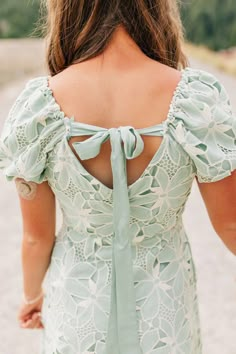 We love the details on this tropical lace dress in mint. With puff sleeves and a tie in the back, the only thing that would make this dress more perfect is pockets! Dresses For Dances, Mint Dress Lace, Garden Of Lights, Sweetheart Bridal, Rehearsal Dinner Dress, Bridesmaid Dress Ideas, Banquet Dresses, Dinner Dress