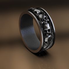 💔Explore your dark side with our exquisite skull ring! Crafted from sterling silver, this vintage gothic masterpiece is designed for those who revel in the macabre. The hammered back adds a touch of uniqueness suitable for any occasion, making it an ideal men's jewelry gift. Express your distinctive personality or surprise a loved one with this versatile piece that seamlessly blends simplicity with character. 💔The antique-style oxidized finish enhances the skull's intricate design, while the s Skull Ring Aesthetic, Black Symbolic Skull Ring For Halloween, Gothic Black Rings With Skull Print, Symbolic Black Skull Ring For Halloween, Gothic Engraved Wedding Rings, Black Skull Print Ring, Black Skull Print Rings For Halloween, Gothic Skull Rings With Engraving, Gothic Sterling Silver Rings With Skull Print