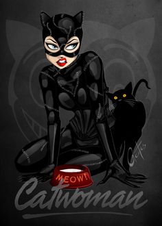 a black catwoman sitting on the ground next to a red light with yellow eyes