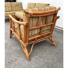 two bamboo chairs sitting next to each other