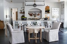 the kitchen is clean and ready to be used as a dining room or breakfast nook