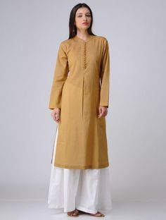 Mustard A-Line Kurta With Palazzo FABRIC DETAILS: TOP COLOR - OFF WHITE, TOP FABRIC - COTTON BOTTOM COLOR- WHITE, BOTTOM FABRIC- COTTON Cotton Kurti Set, Kurti Pattern, Kurta With Palazzo, Suit Styles, Stylish Kurtis Design, Kurta Cotton, Kurti Patterns, Kurti Set