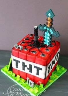 a cake made to look like an old computer game console with the words tht on it