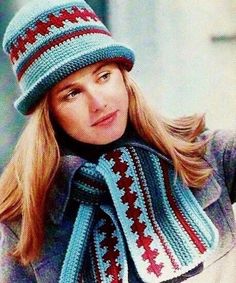 a woman wearing a knitted hat and scarf