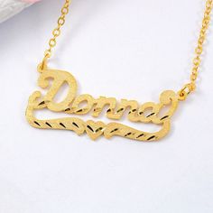 Material: Copper, 925 Sterling Silver. Color: Gold. Process: Gold plated.  Chain Length: 14",16",18",20",22".  Recipient: Women, Mom, Wife, Girl Friend, Children.  Product Type: Personalized Jewelry.  Gift Type: Necklace.  Occasions: Valentine's Day, Mother's Day, Christmas, Birthday, etc.  Necklace Type: Necklace.  Brand: Silviax Jewelry. Customized Gold Heart Necklace For Mother's Day, Gold Heart Necklace With Name For Mother's Day, Customizable Gold Heart Necklace In Sterling Silver, Gold Nameplate Heart Necklace For Mother's Day, Gold Nameplate Charm Necklace For Valentine's Day, Gold Custom Name Heart Necklace For Mother's Day, Gold Heart Necklace With Name For Valentine's Day, Personalized Gold Sterling Silver Heart Necklace, Mother's Day Gold Heart Necklace With Custom Name