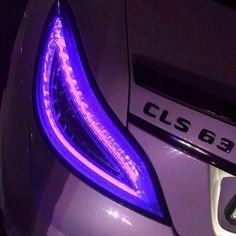 the tail light of a car with purple lights