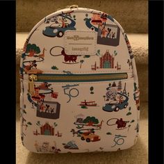 Loungefly Walt Disney World 50th Anniversary Mini Backpack White Disney Travel Backpack, Loungefly Purse, Walt Disney World 50th Anniversary, Disney World 50th Anniversary, Disney World Epcot, Unique Backpacks, Disney Bags, Loungefly Bag, Disney Bag