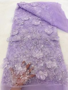 This high quality Fabric is measured in 5 Yards With Beading and Sequin. It is soft, very delicate and beautiful. This high Quality Fabric is made with Fashion embroidered rhinestones can be used in making party wedding dresses, skirts, shawls, scarves and other other fashion apparels as you would like. Size : Length : 5 yards (180 inch). Width: 50 inch (Please allow slight deviation for the measurement data ,±1 inch) Material: 100% Polyester, Tulle Lace Fabric, Eco-Friendly embroidery Color Malva, Beaded Lace Fabric, Lace Fabrics, Cord Lace, Luxury Fabric, Color Lila, African Lace, Fabric Beads, Cloth Material