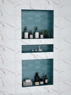 two shelves with soap and lotion on them