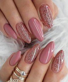 24-Piece Almond Press-On Nails Set in Pink with Pink Sparkly Accent Nails, a stunning and chic collection designed to enhance your nails with a touch of sparkle. Featuring a classic almond shape, each nail in this set is adorned with a lovely pink base, complemented by strategically placed pink sparkly accent nails for a dazzling and eye-catching look. What's Included: FULL SET (24 nails): A meticulously crafted collection of almond-shaped nails, featuring a chic pink base with carefully selecte Mauve Nails, Glitter Manicure, Colorful Nails, Modern Nails, Fake Nail, Trendy Nail Art, Diy Slime, Classy Nails, Fancy Nails