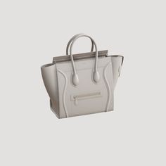 a white handbag on a gray background