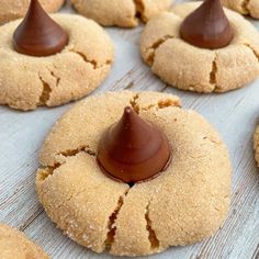 peanut butter cookies with chocolate on top are ready to be eaten and served for dessert