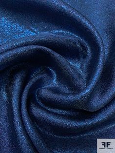 the fabric is shiny and blue