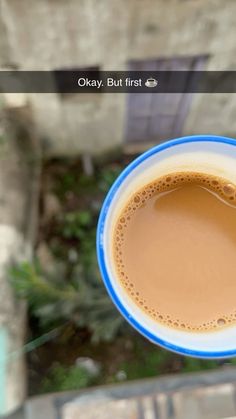 a cup of coffee is seen from above