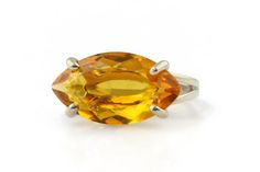 Enjoy wearing the happy luster of this eye-catching Citrine ring, crafted in 925 Sterling silver. This silver ring possesses a captivating beauty that will make it an instant favorite in your jewelry collection. Citrine stone is a known November birthstone.☛ 𝒜𝐵𝒞 - Add Engraving - https://etsy.me/2ZSRjhu☛ Ring size - Select the size you would like from the drop down menu▂▂▂▂▂▂▂▂▂▂▂▂▂▂▂▂▂▂▂▂▂▂▂▂▂▂▂♥ Gemstone Type - Citrine (Heated)♥ Gemstone Size - 12x22mm♥ Gemstone Cut - Faceted Marquise♥ Meta Pink Quartz Jewelry, November Birthstone Ring, Ring Marquise, Fancy Gifts, Gem Ring, Statement Ring Silver, Citrine Ring, Citrine Stone, Labradorite Ring