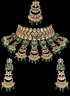 Tiana I - Indian Bridal Set w/ Emerald Drops, Kundan & Green Meenakari work Stunning modern choker necklace for Indian brides with Kundan stone setting. Fit for any fashionista who appreciates the beauty of fine craftsmanship and design all in one stunning set! Stunning green Meenakari work adorns this bridal set in square-shaped metal detail. This set is elaborated with moon design detailing of Kundan gems. This classic bridal jewelry is accented with mini green emerald stone drops at the ends. Green Kundan Chandbalis With Zari Work, Green Kundan Bollywood Jewelry, Heavy Green Kundan Jewelry, Bollywood Green Bridal Sets With Cutdana, Ceremonial Green Kundan Necklace, Wedding Green Meenakari Chandbalis, Traditional Green Meenakari Jewelry, Festive Green Meenakari Jewelry, Green Bridal Sets For Diwali Ceremonial