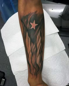 a person with a tattoo on their arm