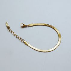 "Check out the matching necklace here: https://www.etsy.com/listing/773115968 --------------------------------------------------------------- Brand new. Selling one piece of gold snake chain bracelet. Instagram style. The bracelet has an extension. The length should fit most people. You may wear it with other jewelry. Material: 18k gold plated titanium Total length: 6\" / 15.5cm plus 1.7\" / 4.5cm extension Bracelet width: 4mm Q&A 1. What is the material? - It is made from 18K real gold plat Flat Snake Chain, Butterfly Anklet, Gold Snake Chain, Herringbone Chain, Bracelet Minimalist, Minimalist Women, Snake Chain Bracelets, Instagram Style, Gold Snake