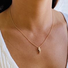 Lighting bolts symbolize strength, bright ideas and intellect. Perfect for wearin alone or layered. Available in sterling silver or gold plated. Chain: sterling silver/14kt gold filleCharm (mm): 16 x 6Length: 16", 18" & 20" Lightning Bolt Necklace, Bright Ideas, Lightning Bolt, 14kt Gold, Silver Gold, Gold Necklace, Gold Plate, Sterling Silver, Chain