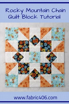 the rock mountain chain quilt block is shown in blue, orange and white with flowers on it