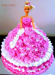 a cake made to look like a barbie doll