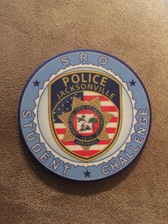 a police badge on the side of a wall