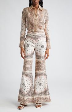 Breezy linen lends a lightness to the structured, flared silhouette of these belted high-waist pants covered in a placed bandana-inspired paisley print. 34 1/2 inseam; 30" leg opening; 12 1/2" front rise; 15 1/2" back rise (size 0) Hidden back-zip closure Removable belt 100% linen Dry clean Imported Designer Clothing Linen Wide Leg Pants, Wide Leg Linen Pants, Printed Pants, Waist Pants, High Waisted Pants, Paisley Print, Leg Pants, Wide Leg Pants, Designer Clothing