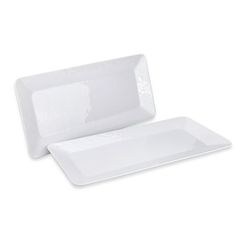 a white plate with two compartments on the side