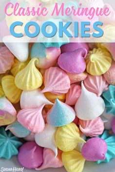 the words classic meringue cookies are in front of some colorful candy candies