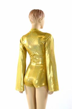 "This item is made to order, please read all the way through the listing before purchasing! This bodysuit is made of a gold metallic holographic sparkly jewel spandex. Long Bell cut sleeves and boy cut legs. This fabric has an amazing holographic sparkle! Deep, plunging v neckline. Four way stretch for a figure forming fit. This bodysuit is unlined. Womens Sizing (See below for instructions on where measurements should be taken) XXS: Bust 29\"-30\" / Waist 22\"-23\" / Hips 30\"-32\" Extra Small: Boy Cut, Boy Cuts, Rave Festival, Olive Branch, V Neckline, Clothing Items, Bell Sleeves, Bell Sleeve Top, Long Sleeve Blouse