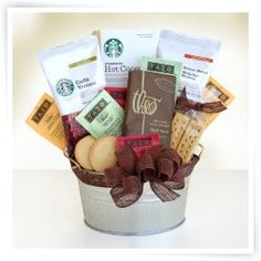 a starbucks gift basket with cookies, crackers and coffee