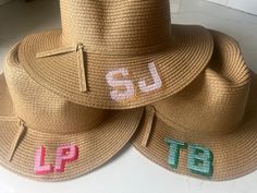 Enjoy the long summer days in style with this straw beach hat. Now you can stay safe from the sun while boating, beaching or picnicking.  It is the perfect addition to your next vacation. Add your initials to make your outfit stand out in the most memorable way.  Please message me to design the perfect gift for teacher presents, Mother's Day, or bachelorette parties. Summer Wide Brim Embroidered Hats, Summer Embroidered Wide Brim Hat, Embroidered Wide Brim Summer Hat, Embroidered Straw Hat For Beach With Short Brim, Beach Sun Hat With Embroidered Short Brim, Embroidered Straw Hat With Curved Brim For Summer, Embroidered Short Brim Straw Hat For Summer, Summer Embroidered Straw Hat With Curved Brim, Embroidered Brimmed Straw Hat For Summer