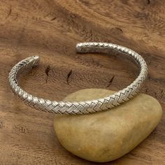 "❋ Handmade Braided Sterling Silver 1/4\" wide Cuff Bracelet For Women or Men ❋ Size: Large for women, Medium - Large for men, The Length is about 7 inches (18cm), flexible and adjustable ❋ Metal Purity: 95% Pure Silver (Purer than sterling Silver - 92.5%) We also have Braided Silver Matching Earrings and Rings To browse some more of our silver jewelry collection you can click on the following links: https://www.etsy.com/shop/SilverShapes Earrings: https://www.etsy.com/shop/SilverShapes?section_ Artisan Adjustable Bangle With Oxidized Finish, Handmade Adjustable Sterling Silver Bracelet For Ceremonial Occasions, Adjustable Sterling Silver Bangle For Ceremonial Occasion, Traditional Adjustable Engraved Braided Bracelets, Handmade Adjustable Bangle For Ceremonial Occasions, Traditional Engraved Adjustable Braided Bracelets, Adjustable Artisan Cuff Bracelet For Ceremonial Use, Traditional Adjustable Engraved Braided Bracelet, Adjustable Artisan Cuff Bracelet For Ceremonial Occasions